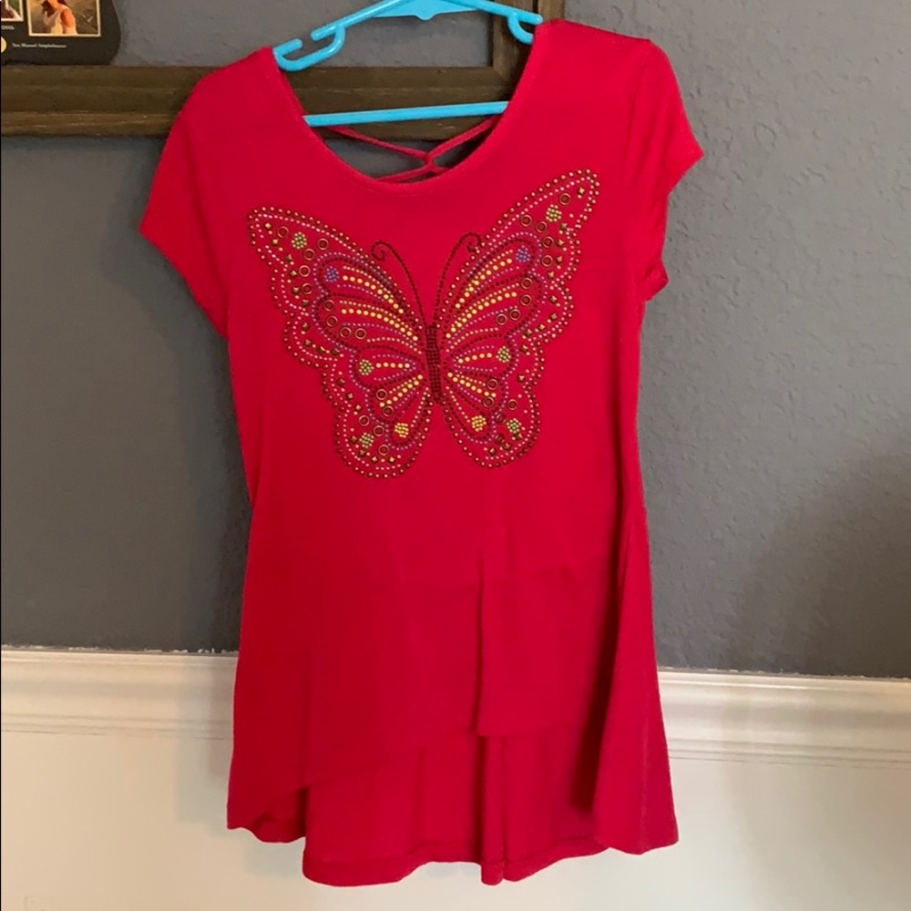 A pink butterfly shirt